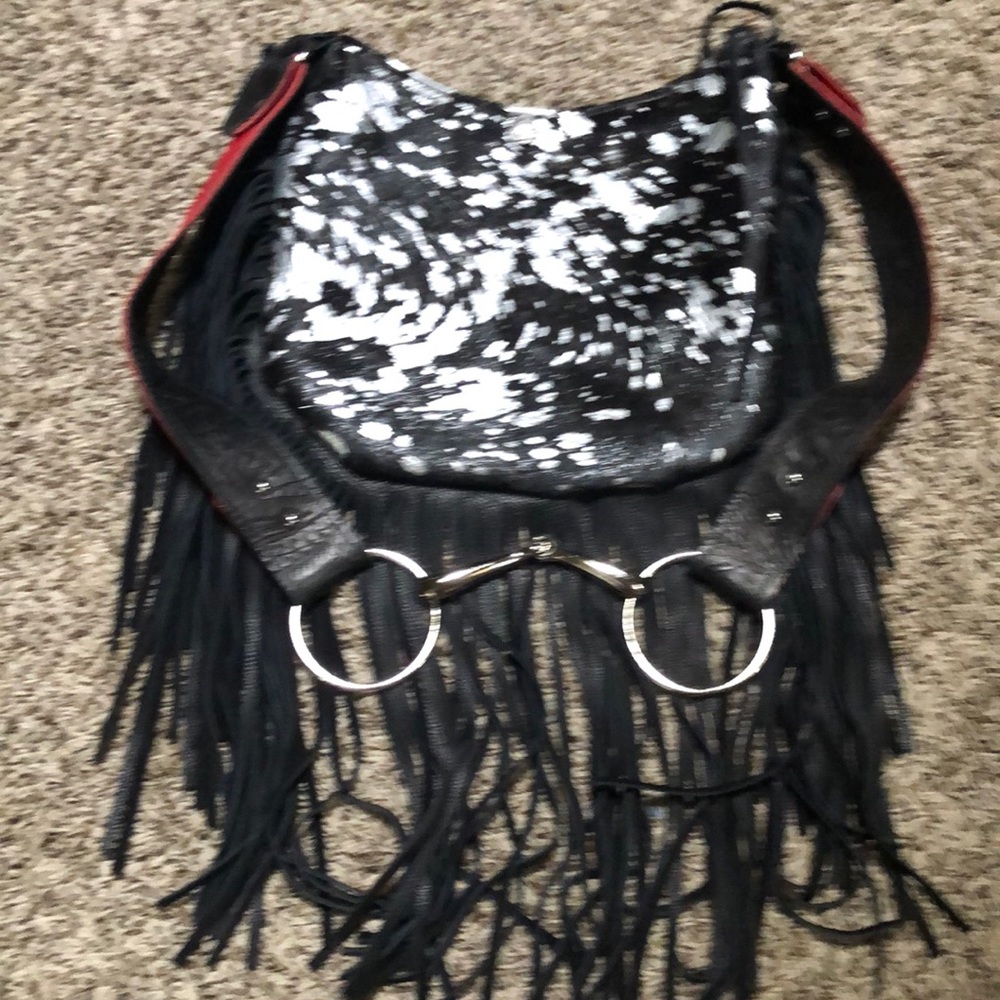 Genuine leather handmade hobo bag.